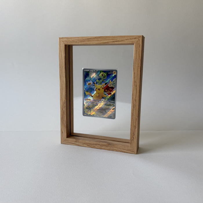 PokeFrame Log Wood 1-card display, studio shot, Pikachu card